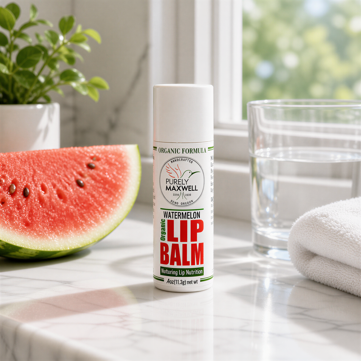 a bottle of organic lip balm placed on a marble countertop, with a slice of watermelon and a glass of water nearby.
